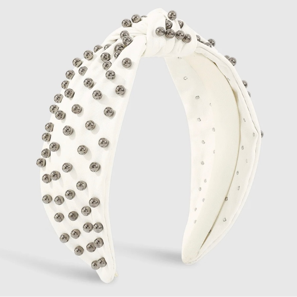 White vegan leather headband.